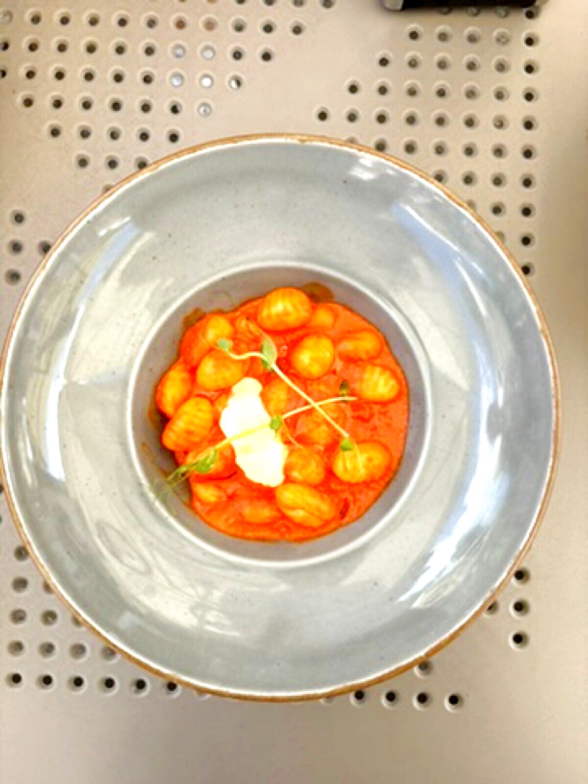 Gnocchi al pomodoro with mascarpone and microherbs