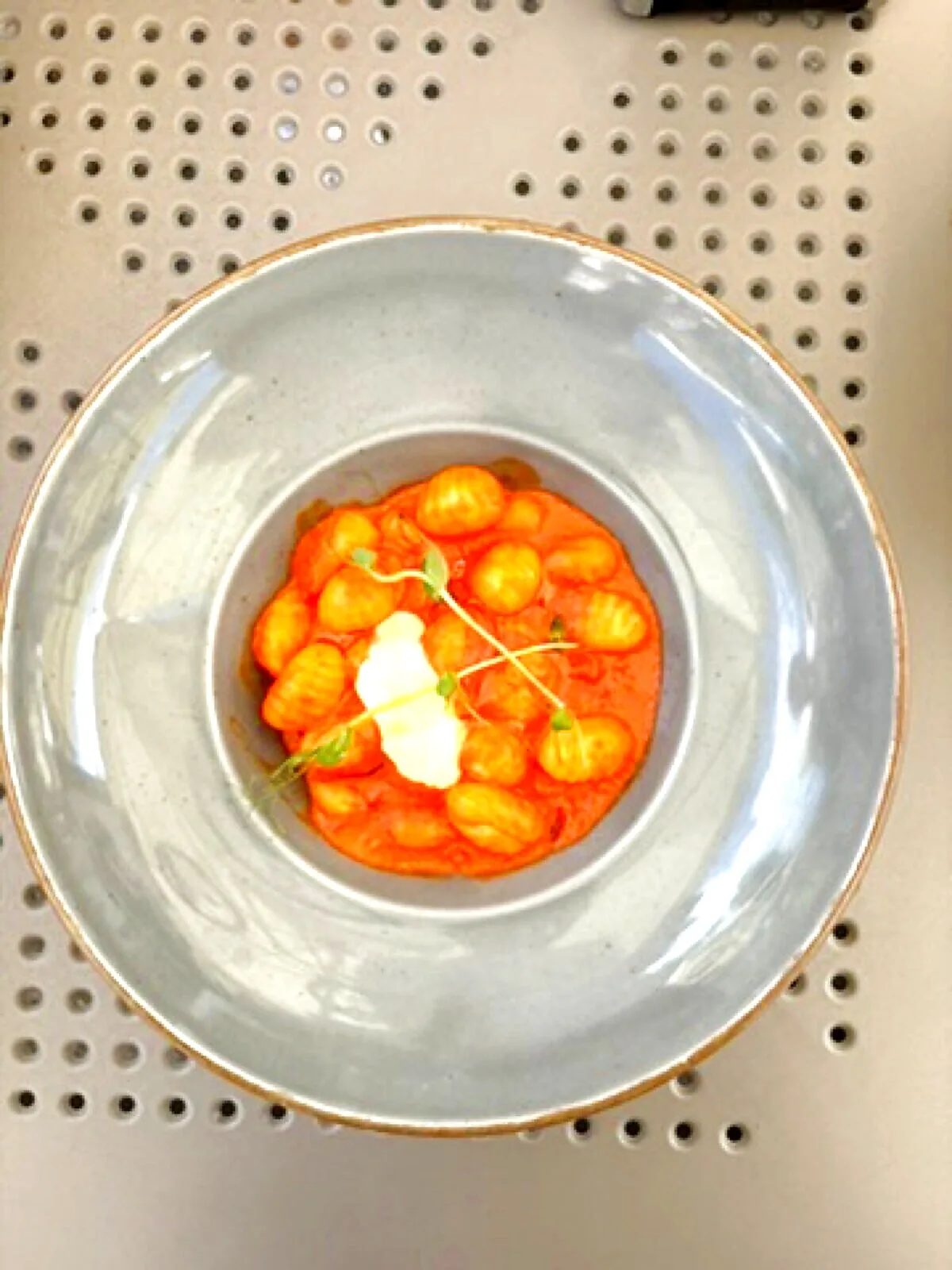 Spaghetti al pomodoro with mascarpone and microherbs